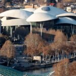 Aerial view of futuristic architecture in Tbilisi, Georgia, showcasing unique modern design.